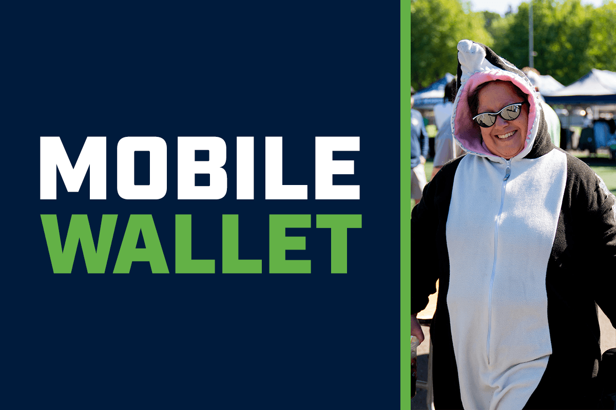 Seattle Seawolves supporter scans a mobile ticket at the Starfire Stadium entry gate.